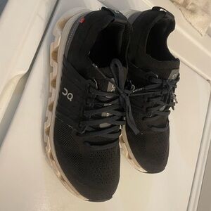 On Running Black and White Athletic Shoes